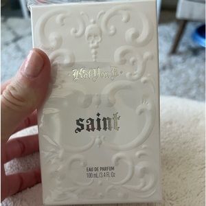 NEW IN BOX 3.4 OZ KAT VON D SAINT PERFUME. PACKAGING STILL SEALED